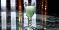 Absinthe Drip cocktail in wine glass