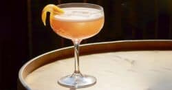 Brown Derby cocktail with grapefruit twist in coupe glass
