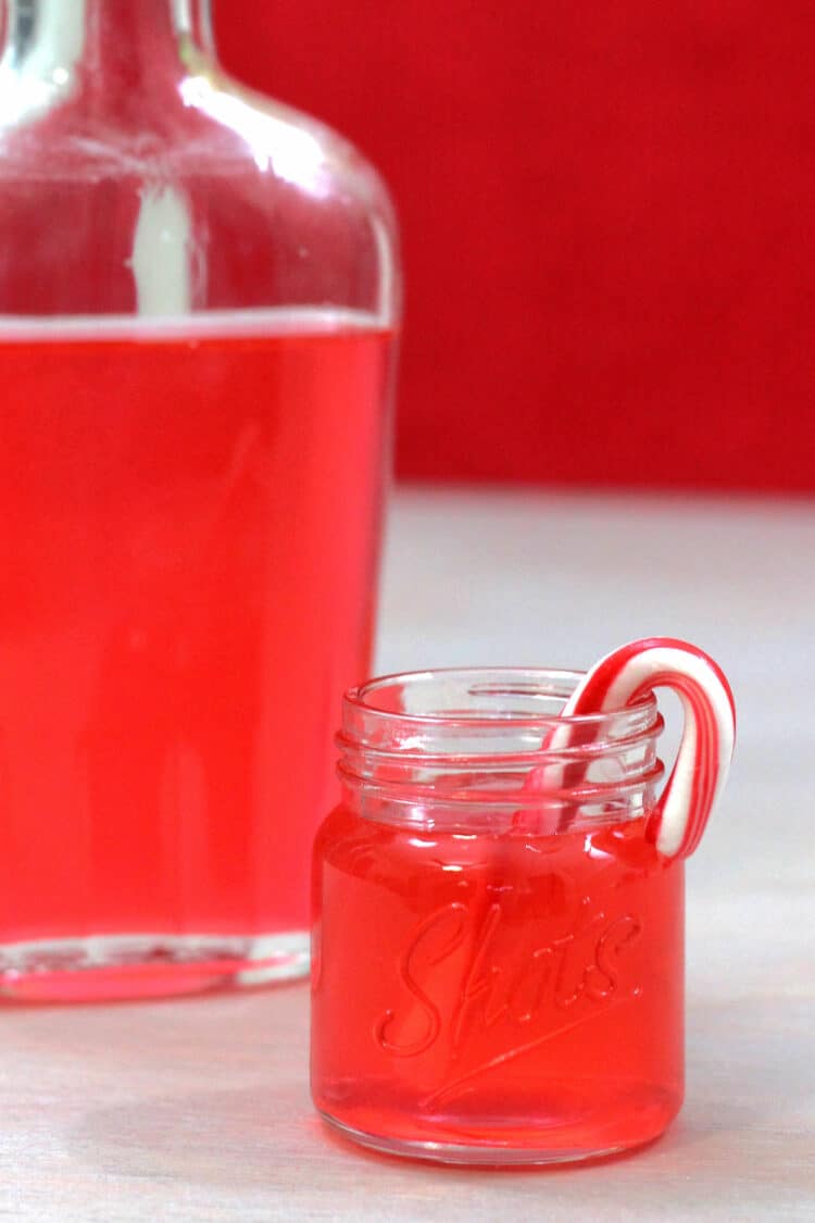 Candy Cane Vodka infusion in flask and shot glass