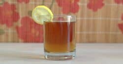 Grand Apple drink with lemon wheel