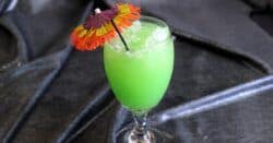Green Eyes Drink with colorful cocktail umbrella