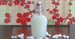 Homemade marshmallow liqueur in glass bottle