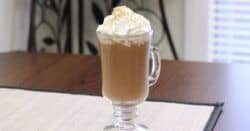 Irish Coffee drink with whipped cream on table