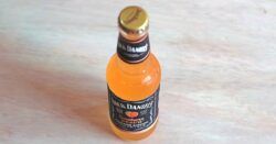 Jack Daniel's Southern Peach bottle on table