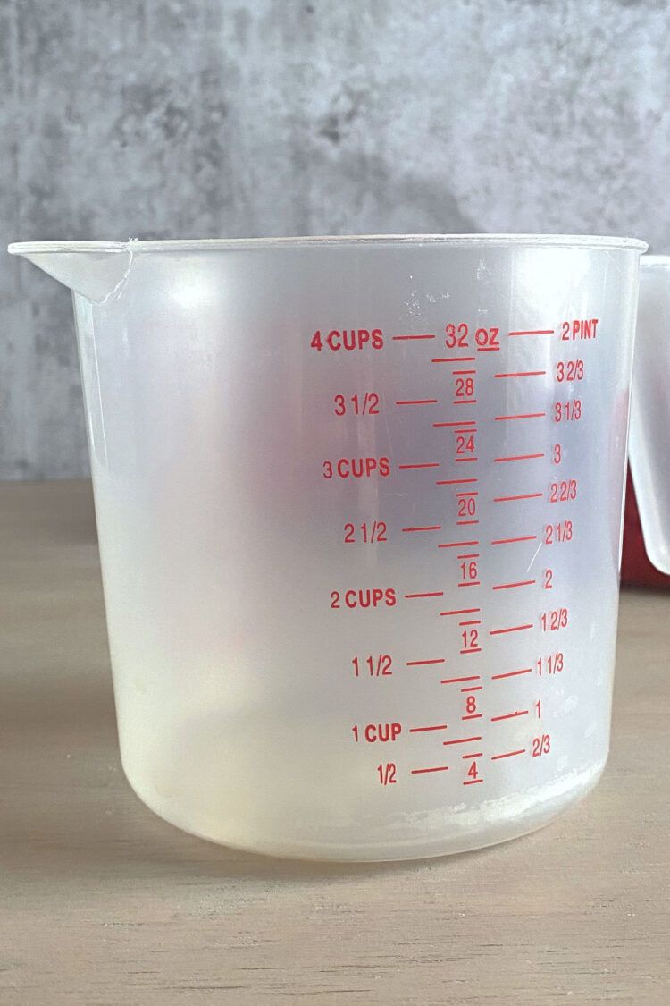 Measuring cup on table