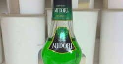 Bottle of Midori on kitchen counter