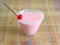 Pink Diamond drink with cherry and sugar rim