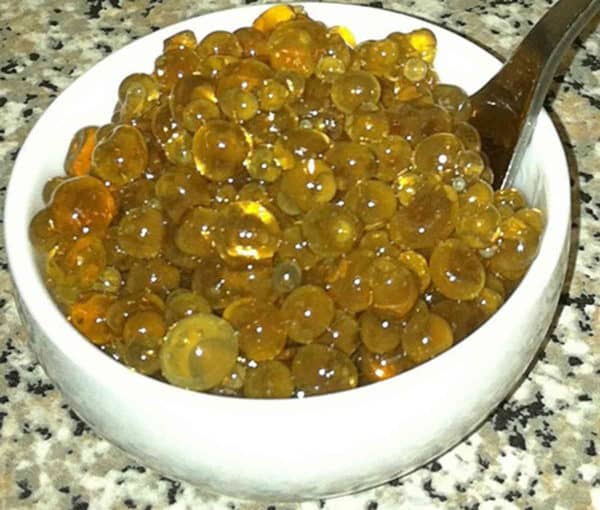 Rum Caviar in bowl with spoon