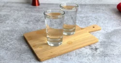 Vodka shots on a cutting board
